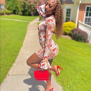 Floral print bodycon dress also fits small.